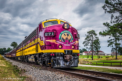 ALL ABOARD: THE MAGENTA TRAIN ARRIVES IN CHARLOTTE