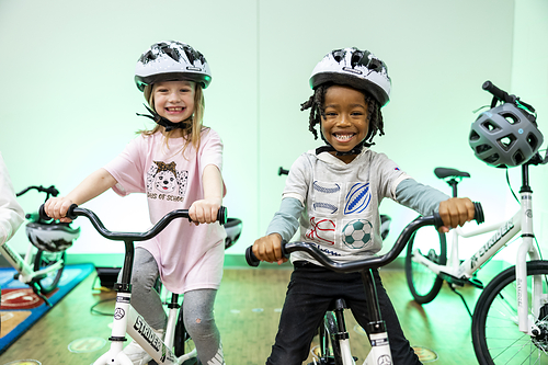 The All Kids Bike Kindergarten PE Learn-to-Ride Program gives kids a chance to learn how to ride a bike in school, and is currently active in 1,800+ schools across all 50 states. The nonprofit's new district-wide implementation model will expand access to this life-changing program by offering tiered discounts based on the number of programs adopted by participating districts, with further incentives for long-term planning. The All Kids Bike Kindergarten PE Learn-to-Ride Program gives kids a chance to learn how to ride a bike in school, and is currently active in 1,800+ schools across all 50 states. The nonprofit's new district-wide implementation model will expand access to this life-changing program by offering tiered discounts based on the number of programs adopted by participating districts, with further incentives for long-term planning.