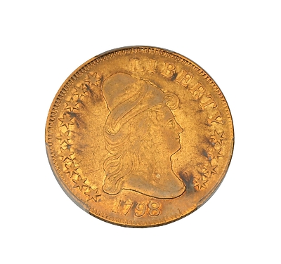 1798/7 overdate $10 Capped Bust Heraldic Eagle with 9x4 stars, graded Very Fine 30 by PCGS, an important variety with the second-lowest mintage of the series. Sold for $32,595