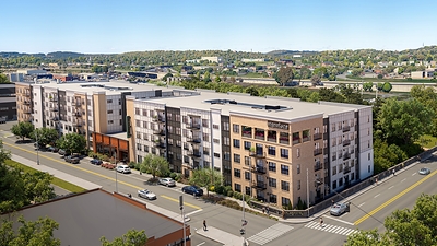 An aerial rendering of Signature on Grand, a new off-campus student housing community located near the University of Tennessee, Knoxville. Slated for a Fall 2027 delivery, the development offers modern architecture and convenient urban connectivity for the UTK student population