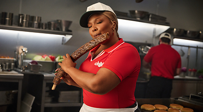 The video shows Lizzo, an accomplished artist and classically trained flautist, busting out a flute custom designed to look like a Chili’s Baby Back Rib.
