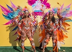 Masqueraders pose at the Antigua Carnival Pop-up to celebrate this summers carnival season