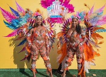 Masqueraders pose at the Antigua Carnival Pop-up to celebrate this summers carnival season