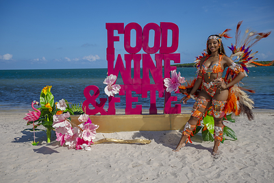 Our FWF Beachside pop-up with masqueraders from Antigua's Activation experience - photo by Colin Subratie.jpg