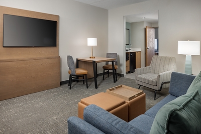 Updated suite living area at Embassy Suites by Hilton Lexington/UK Coldstream showcasing modern furnishings, flexible gathering space, and the brand’s signature all-suite accommodations.
