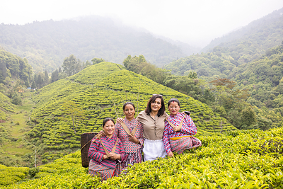 Brook37, founder Mou Dasgupta in the middle, surrounded by the tea team
