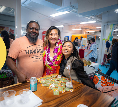 Founder of Hawaiian Vinegar Company Brandon Askew (left) with Dr Loretta Chen, Chief Operating Officer at Smobler (center) with guest, Summer Le at the soft launch of ROBIN AI at Hawaii Tech Week 