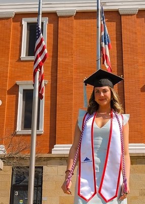 Emilee Mueller of Louisville, Ohio, graduates from the University of Akron with an undergraduate degree in education.