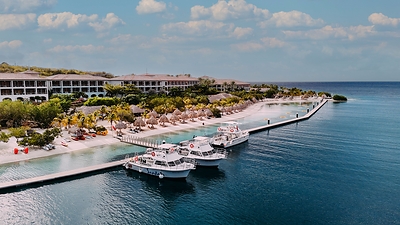 Aerial view of Sandals Royal Curaçao, where guests can immerse themselves in Curaçao’s historic soccer summer through the resort’s Vacation Goals: Curaçao Edition program, featuring spirited watch parties, local cultural experiences, and opportunities to connect with sustainability initiatives making an impact across the island.