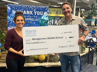 L/R: North Island Credit Union Senior School & Community Development Officer Shadi Poustchi presents a North Island Credit Union Foundation Teacher Grant to Montgomery Middle School Principal Jeremy Hurlbert. The grant will fund a STEAM-based initiative within the school’s World History program, integrating engineering design into their studies of the Renaissance and Scientific Revolution by constructing models of a Gutenberg-style printing press. L/R: North Island Credit Union Senior School & Community Development Officer Shadi Poustchi presents a North Island Credit Union Foundation Teacher Grant to Montgomery Middle School Principal Jeremy Hurlbert. The grant will fund a STEAM-based initiative within the school’s World History program, integrating engineering design into their studies of the Renaissance and Scientific Revolution by constructing models of a Gutenberg-style printing press.