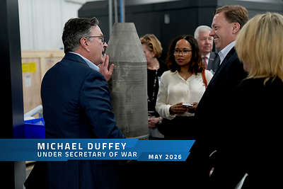 Titomic CEO & Managing Director Jim Simpson showcases a large-scale warhead component to Under Secretary of Defense Michael Duffey during a visit to Titomic USA, May 2026.