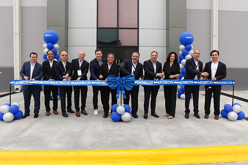 GroupMosca executives cut the ribbon officially opening the new facility. GroupMosca executives cut the ribbon officially opening the new facility.