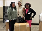 Rachelle Paul-Brutus, Executive Director of the Chicago Asthma Consortium, with Certified partner product donations at the 2026 CHW Educational Forum, Chicago, May 21, 2026.