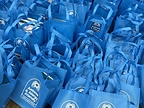 300 Asthma & Allergy Friendly® Resource Tote Bags, packed with educational materials and Certified partner contributions for distribution across Chicago communities, May 2026.