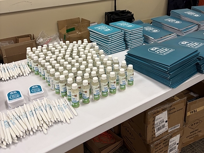 Asthma & Allergy Friendly® Certification Program materials and Free & Clear Certified laundry detergent samples, prepared for distribution at the 2026 CHW Educational Forum, Chicago.