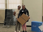 Rachelle Paul-Brutus, Executive Director of the Chicago Asthma Consortium, with a Kimberly-Clark/Kleenex® product donation at the 2026 CHW Educational Forum, Chicago, May 21, 2026.
