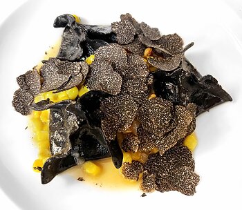 Available for just 12 days, the 2026 Summer Edition menu will feature fresh black truffles in every course. Photo by Megan Menicucci