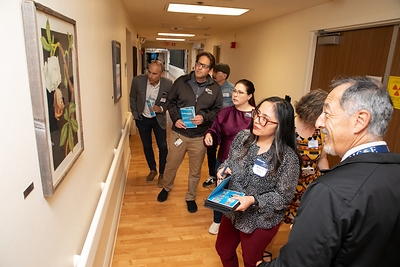 Visitors to Salinas Valley Health Medical Center admire student art in the corridors. 