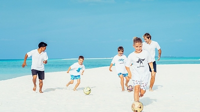 At Four Seasons Resort Maldives at Landaa Giraavaru, the game takes on an island rhythm with football legends