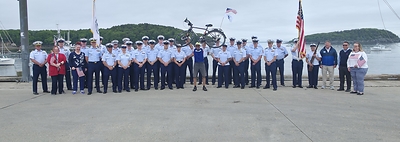 Coast Guard members, community supporters, and Coast Guard Mutual Assistance representatives welcome retired Vice Adm. Manson K. Brown to Bar Harbor, Maine, on June 11, 2026, following his more than 2,170-mile solo, unsupported bicycle journey from Key West, Florida. Photo courtesy of Coast Guard Mutual Assistance.