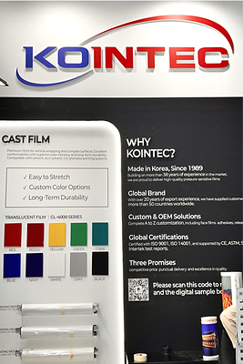 This image shows a KOINTEC wall panel with the brand logo, cast film color swatches, and company info.