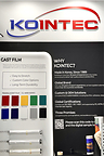 This image shows a KOINTEC wall panel with the brand logo, cast film color swatches, and company info.