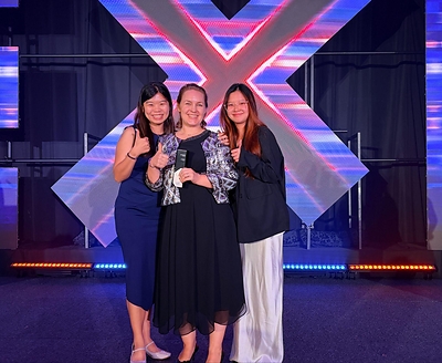 NLCS (Singapore) HR team receiving the Bronze award for Best HR Digital Transformation Strategy at the Employee Experience Awards 2026