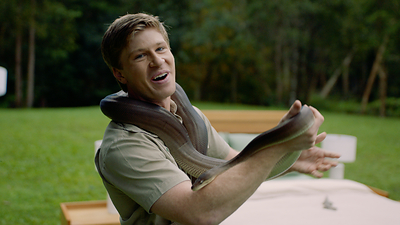 Robert Irwin with snake.