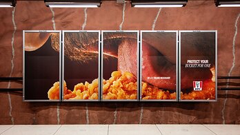 An OOH execution shows a playful tactic to make delicious fried chicken unsharable in KFC's latest campaign This image opens in the lightbox