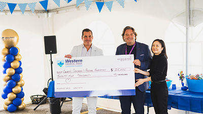 Western Financial Group CEO Grant Ostir (left) and Western Communities Foundation Director Michelle Mak (right) present a cheque for $25,000 to Stefano Grande, President & CEO of the Children’s Hospital Foundation of Manitoba.