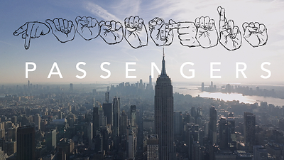 The official title card for Passengers NYC, featuring the film's name spelled in American Sign Language (ASL) above the New York City skyline. Written and directed by OBIE Award-winning Deaf filmmaker Dickie Drew Hearts, Passengers NYC is a three-time Gold Telly Award winner currently on its ALLMYNE-sponsored international festival tour. (Photo: Courtesy of Passengers NYC / ALLMYNE)