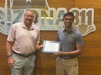 Bill Turner, President and CEO of Tennessee 811, presents Roni Ahmed, Director of Information Technology at MISS DIG 811, with his certificate of completion for the OCEAN (One Call Executive Apprentice Network) 811 Executive Apprentice Program. Bill Turner, President and CEO of Tennessee 811, presents Roni Ahmed, Director of Information Technology at MISS DIG 811, with his certificate of completion for the OCEAN (One Call Executive Apprentice Network) 811 Executive Apprentice Program.