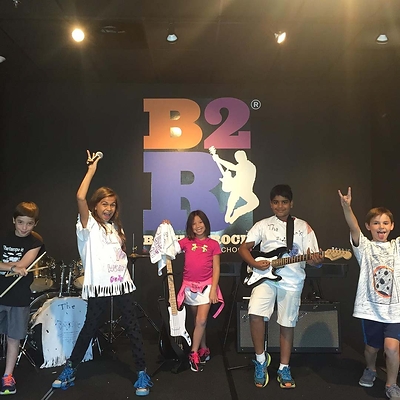 At Bach to Rock summer camps, kids get to perform on stage, make new friends, have fun and build confidence at the same time! At Bach to Rock summer camps, kids get to perform on stage, make new friends, have fun and build confidence at the same time!