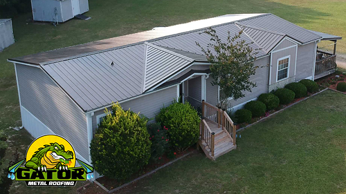 Carolinian home with durable, energy efficient metal roofing in the color bronze.