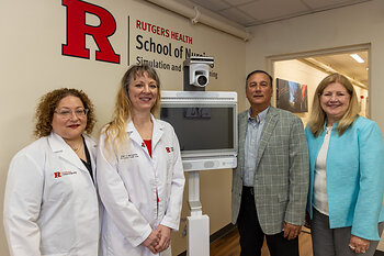 L to R: Jeannette Manchester (Assoc Dean, Assoc Prof) and Angela Starkweather (Dean), Rutgers School of Nursing; Mike Brandofino (Pres, COO) and Susan Kristiniak (CNO), Caregility. Photo: Jeff Arban.