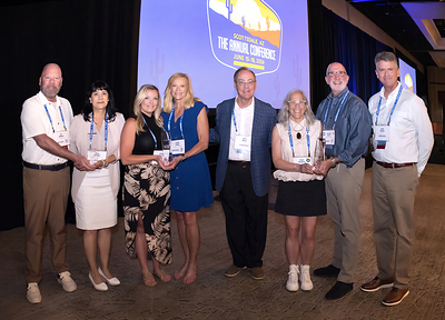 L-R: Lee & Letty Inabinet (Finalist Eddie Thomas from Northeast San Antonia, TX), Ashley Rinehart & Connie Nelson (Winner Tiffany Moon from Charlestown, WV), Founder & CEO Larry Meigs, Karen Woodrow & Larry Michel (Finalist Amanda Williams from Chelmsford, MA) and President Scott Parrish
