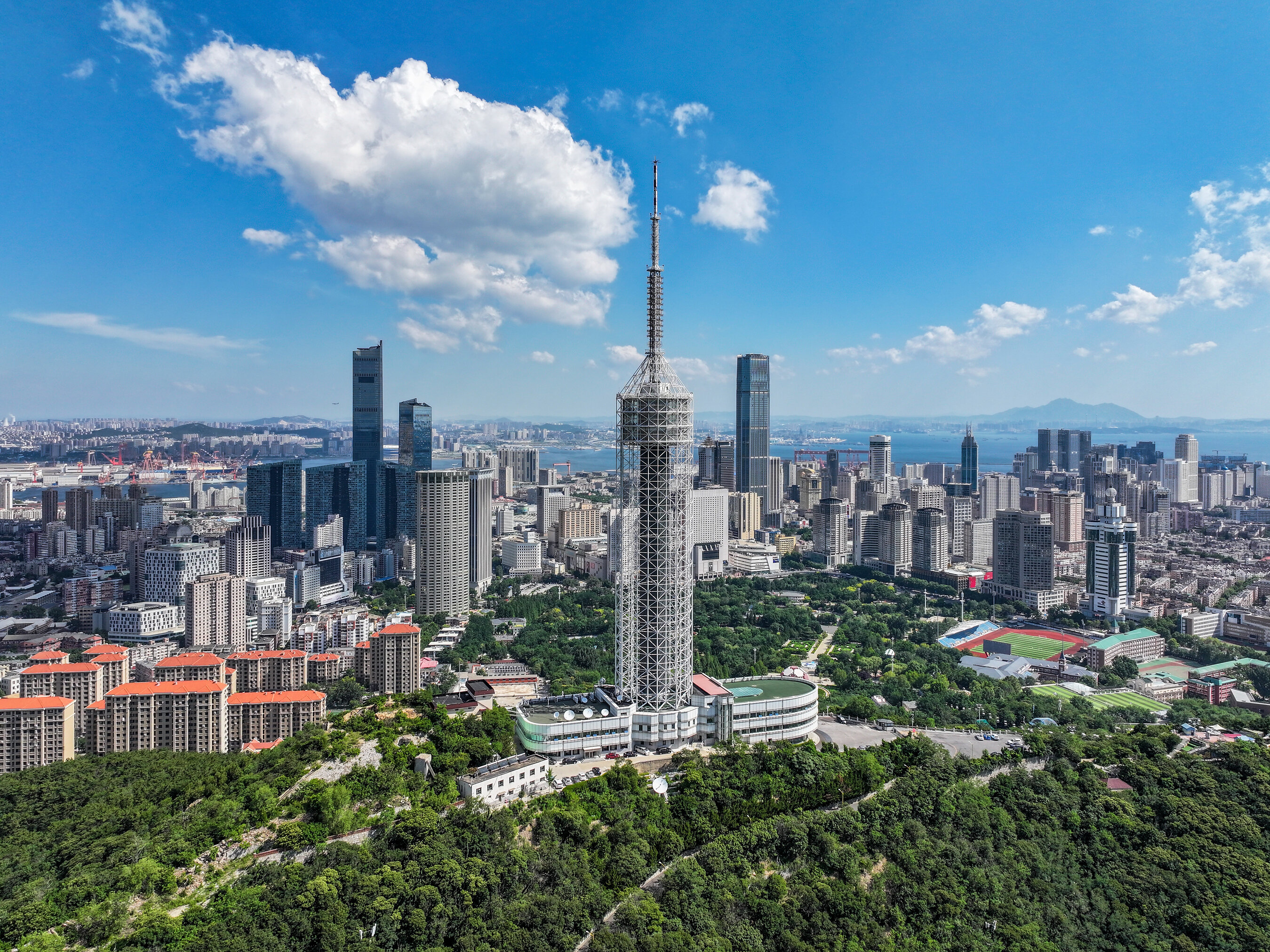 Summer Davos spotlight falls on host city Dalian's economic rise