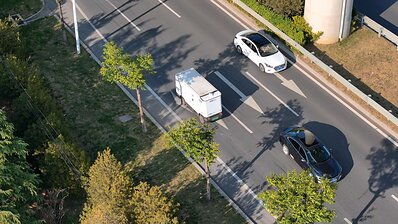 A Neolix autonomous delivery vehicle operating on public urban roads.