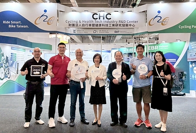 Representatives from the Ministry of Economic Affairs (MOEA) and the bicycle industry gather for a group photo at the Cycling & Health Tech Industry R&D Center (CHC) booth during EUROBIKE 2026. Distinguished guests (from left): James Ting, General Manager of Mega Joy Enterprise Co., Ltd.; Alex Lee, General Manager of CHC; Patrick Pai, Chairman of MARWI Group (and Chairman of CHC); Cynthia Kiang, Deputy Minister of the Ministry of Economic Affairs (MOEA); Chung-Bin Jou, Deputy Director General of the Department of Industrial Technology (DoIT), MOEA; Jeff Chen, General Manager of Joy Industrial Co., Ltd. (and Vice Chairman of BAS); Hope Chou, Secretary General of the Taiwan Bicycle Association (TBA)