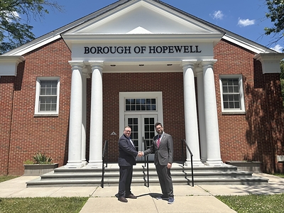Photo Caption: New Jersey American Water President Mark McDonough (left) and Hopewell Borough Mayor Ryan Kennedy at the financial closing of the company’s acquisition of Hopewell Borough’s water system.