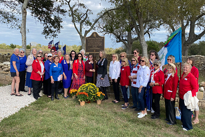 DAR members and chapters have placed 485 America 250 Patriot Markers at historic sites, parks, cemeteries, and battlefields across the country and abroad to ensure the men and women who helped secure American independence 250 years ago are honored for future generations. DAR marker ceremonies like this one held by the Coushatti Trace Chapter in Texas are organized to engage local communities in celebration of American history.