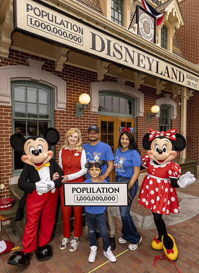 Disneyland Resort President Jill Estorino Greets Honorary One Billionth Guest:  Jill Estorino, President, Disneyland Resort, greets the honorary one billionth guest, Andres Robles, 8, and his parents at the Main Street, U.S.A., train station platform in Disneyland park in Anaheim, Calif., on Friday, July 3, 2026. The momentous occasion commemorates a historic milestone, welcoming one billion guests to Disneyland park and Disney California Adventure park. (Christian Thompson/Disneyland Resort) 