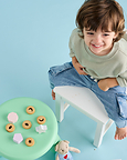 Toddler snacking on Little Bellies organic snacks.