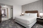 Renovated king suite at Embassy Suites Charlotte Concord features contemporary furnishings, modern finishes and enhanced comfort.