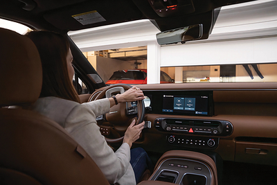 A Hyundai Palisade driver uses the Hyundai myQ Connected Garage in Mission Viejo, Calif., on March 12, 2026.