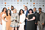 Givelify team members celebrate win in New York.  Back row: Dione Martin, Hari Krishna, John Kane, Chi Vong, and Nandu Goli.  Front row: Juana Véliz, Karen Scheid, Deinis Matos, and Claire Jordan.  