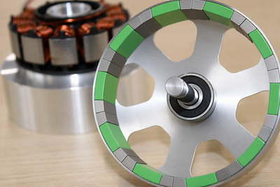 Disassembled ASPINA brushless DC motor built with Niron Magnetics' coated Iron Nitride magnets.