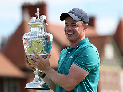Stuart Grehan of Ireland holds the trophy after his victory during the Final of the 2026 Amateur Championship at Royal Liverpool Golf Club on June 20, 2026, in Hoylake, England. (Photo by Oisin Keniry/R&A/R&A via Getty Images)