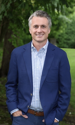 Peter Robbins serves as President of Commercial Services 