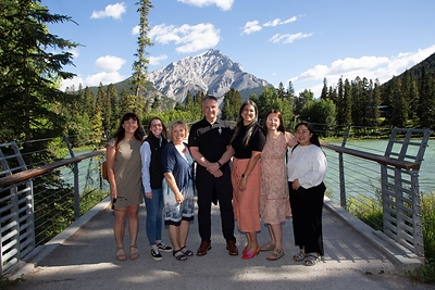 From left to right: Ebony Rempel, Karen Thomson, Karen Shelton, Minister Heath MacDonald, Salina McNamara, Rae Bilodeau, and Joanna Haniel. From left to right: Ebony Rempel, Karen Thomson, Karen Shelton, Minister Heath MacDonald, Salina McNamara, Rae Bilodeau, and Joanna Haniel.